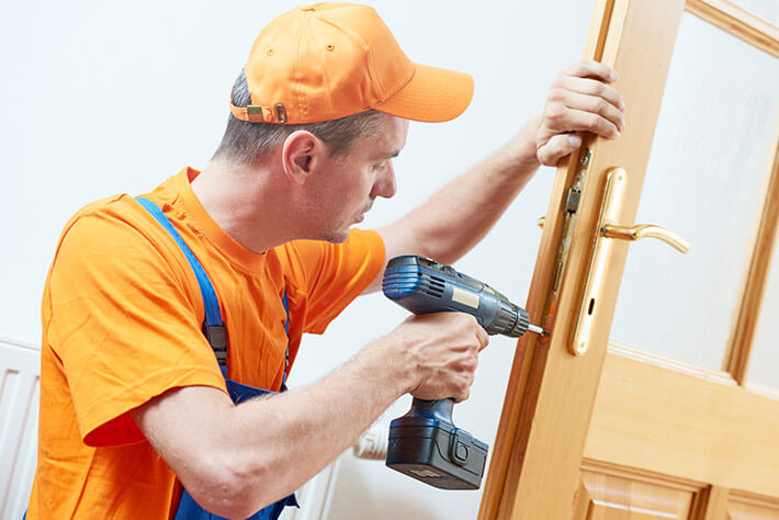 ADL-Carpenter at door lock installation or repair